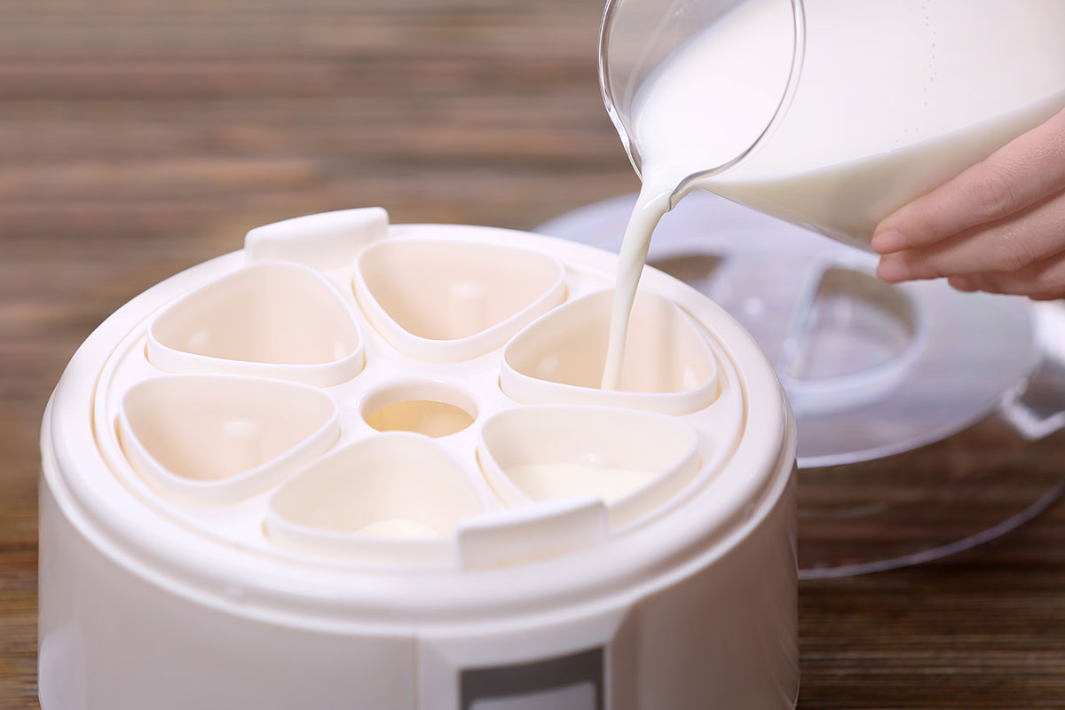 _milk_being_poured_into_maker
